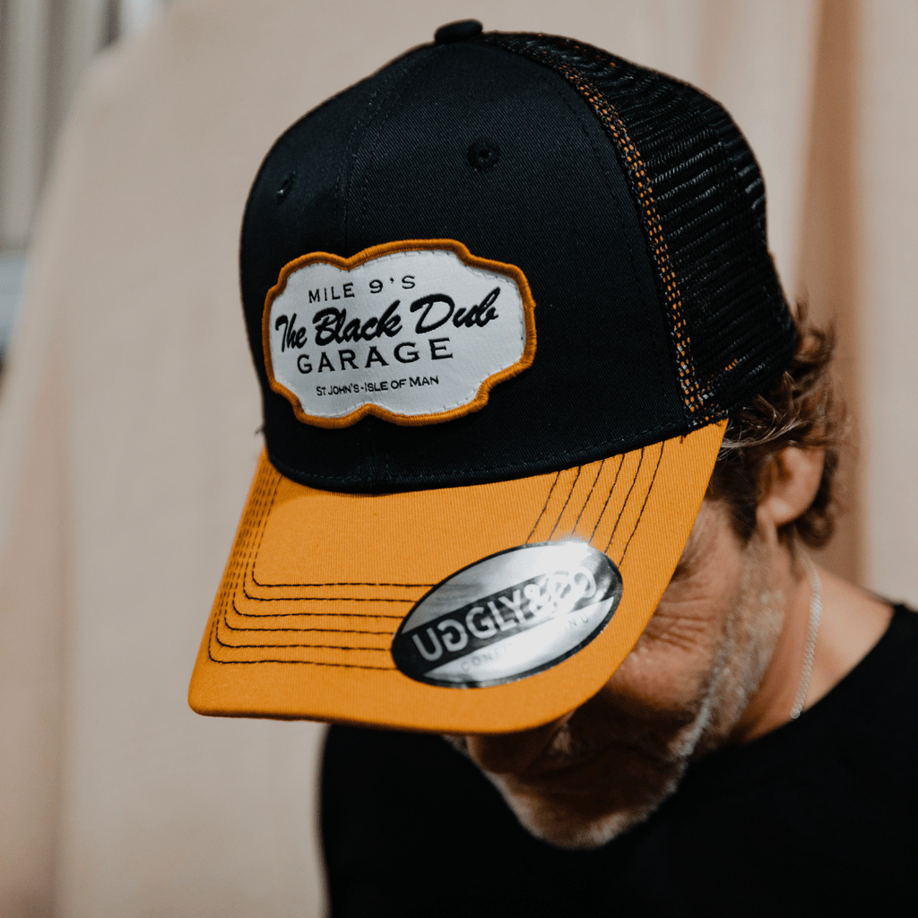 Black Dub Garage Trucker Hat – Black & Yellow Mesh Cap by Uggly and Co