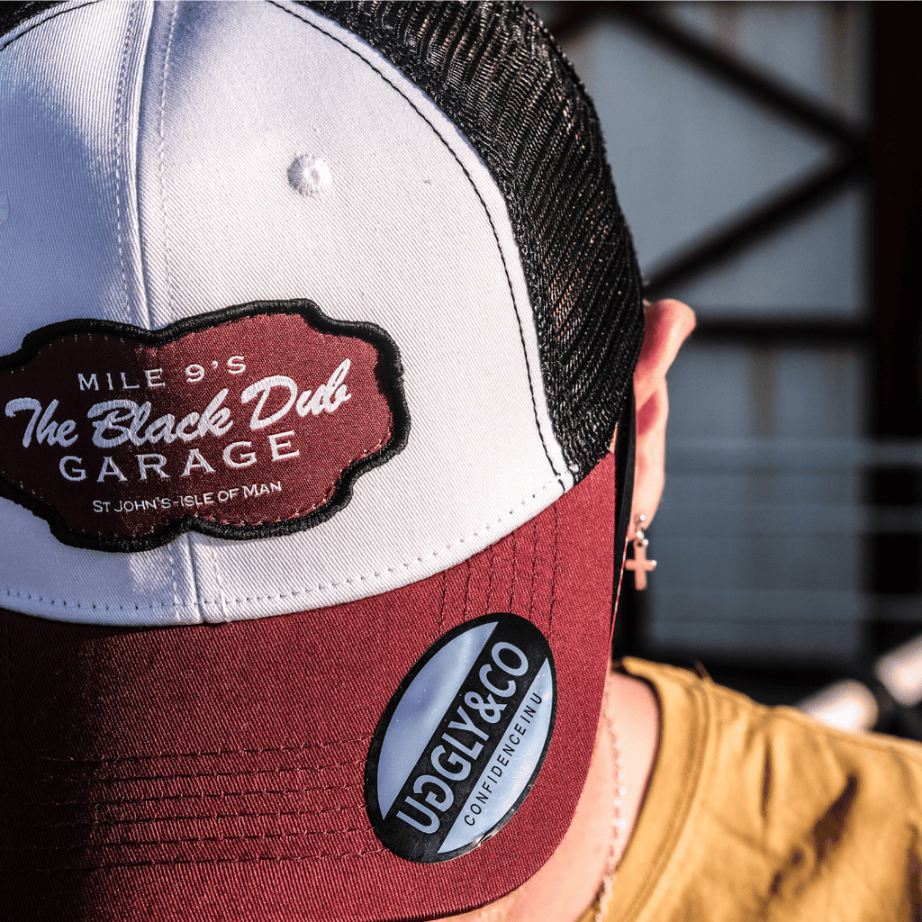Uggly and Co Black Dub Garage Trucker Hat – Burgundy Isle of Man TT