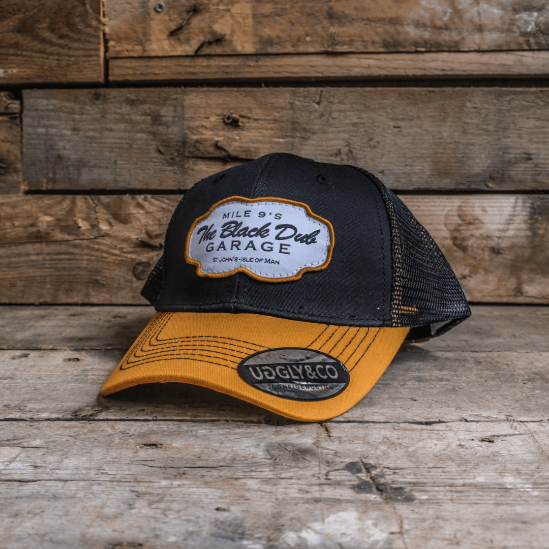 Black Dub Garage Trucker Hat – Black & Yellow Mesh Cap by Uggly and Co