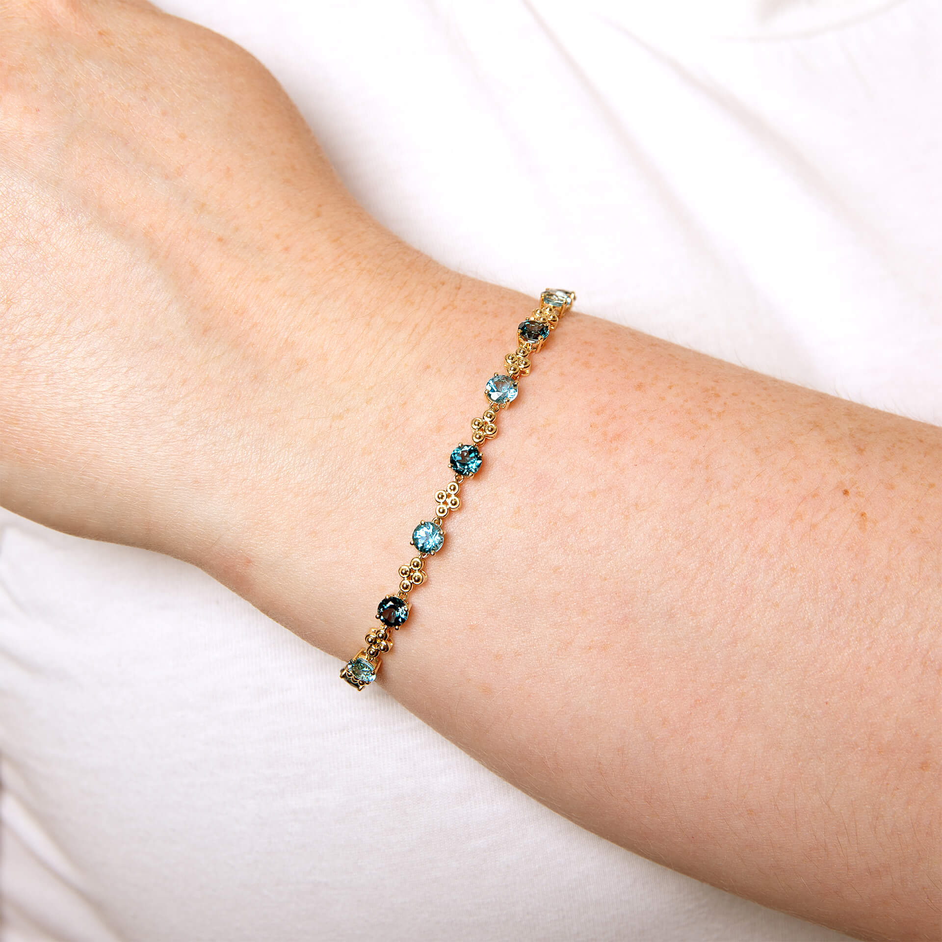 Gecko Jewellery Ornate Blue Topaz Bracelet in 9ct Yellow Gold