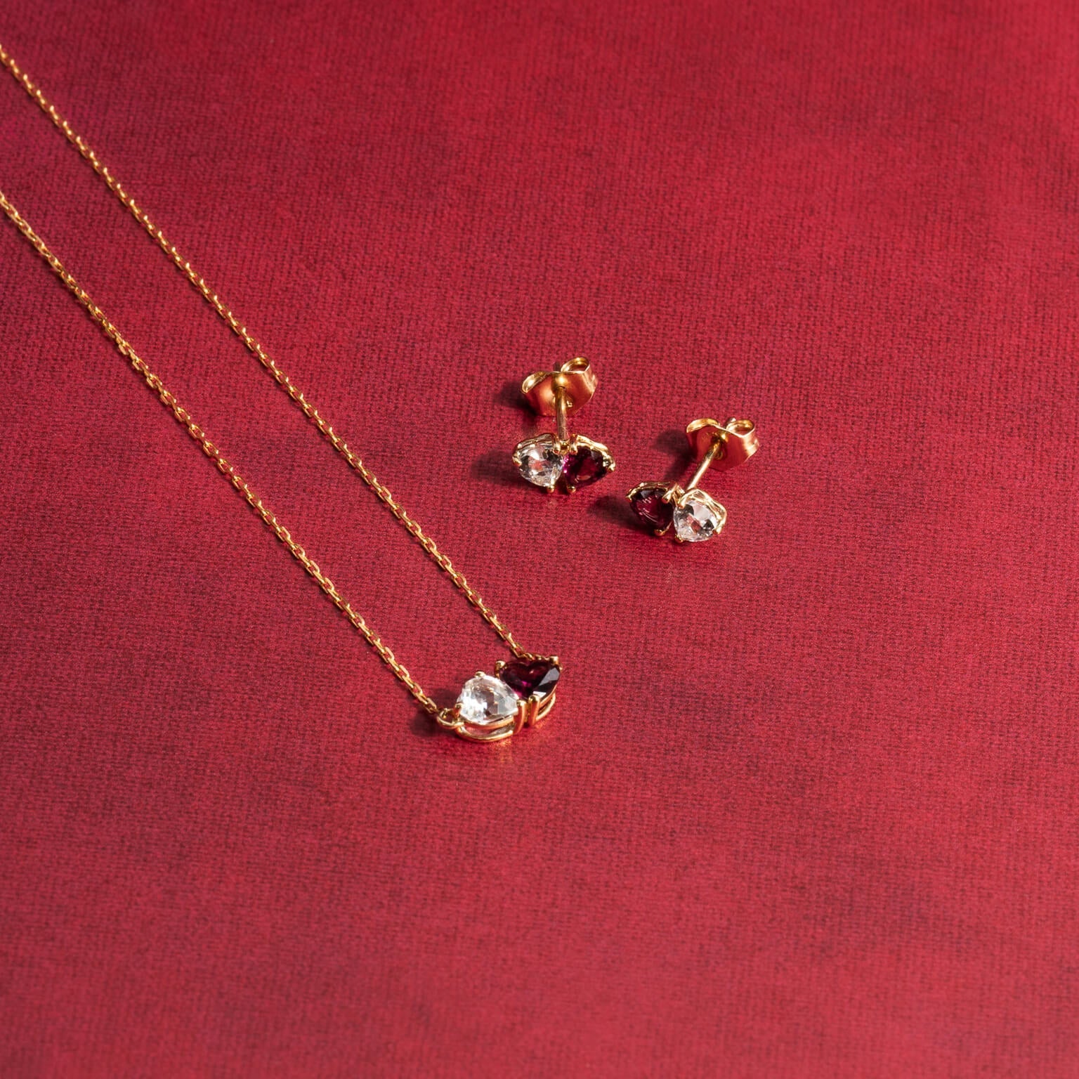 Gecko Jewellery Toi et Moi 9ct Gold Heart Stud Earrings | Topaz & Garnet