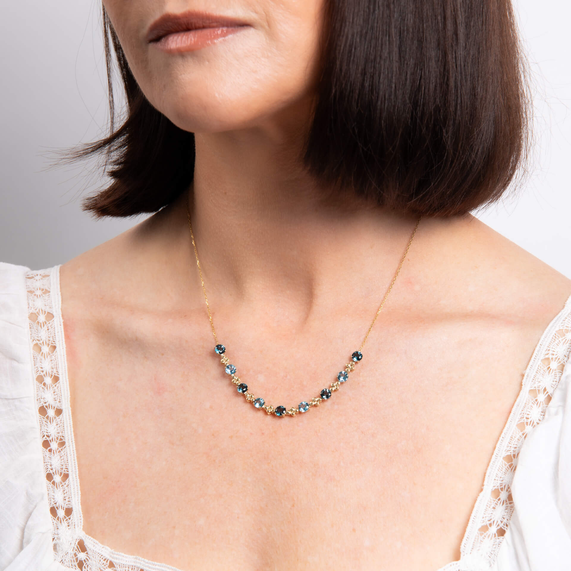 Gecko Jewellery Ornate Blue Topaz Necklace in 9ct Yellow Gold