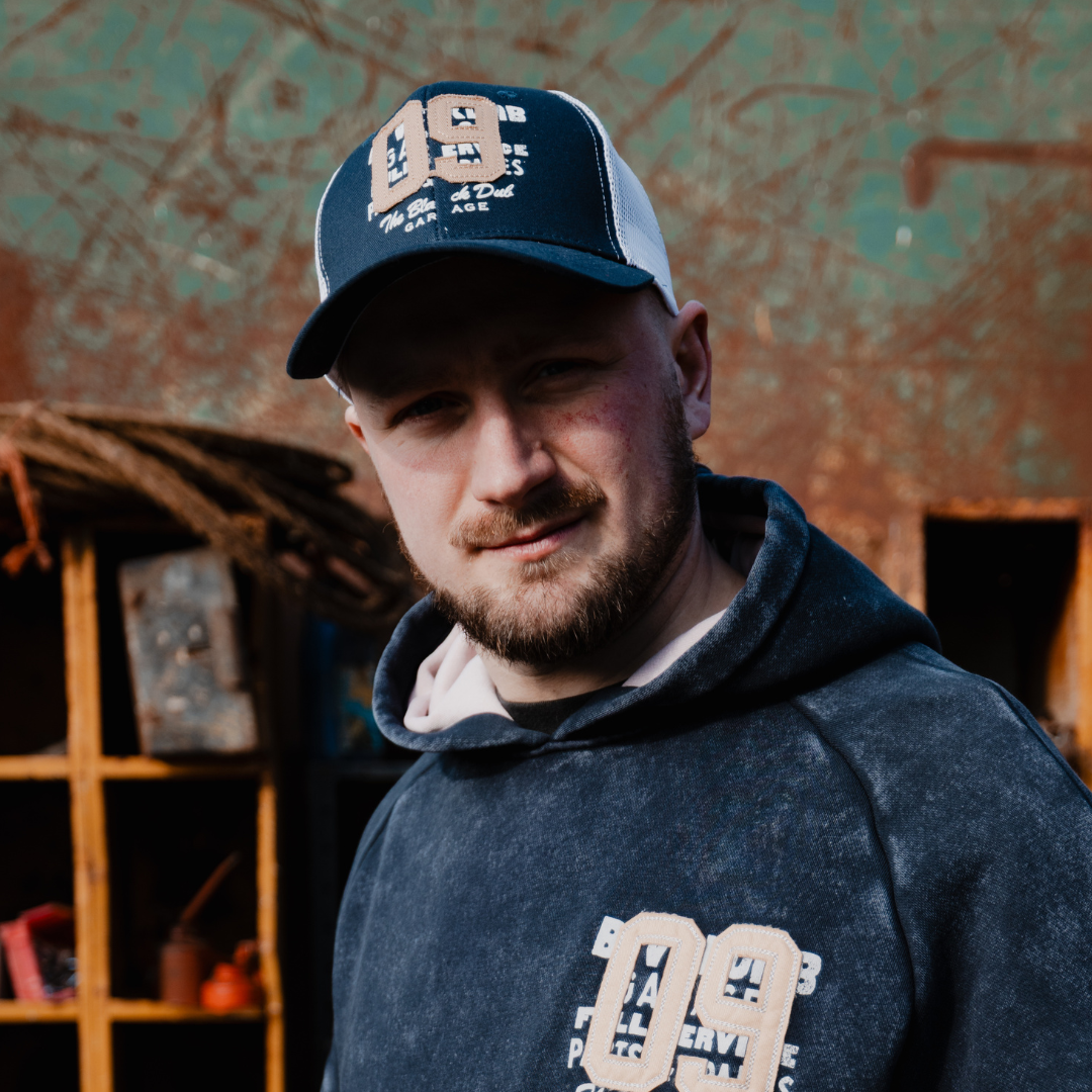 Uggly and Co Navy Parts & Spares '09' Vintage Moto Trucker Hat