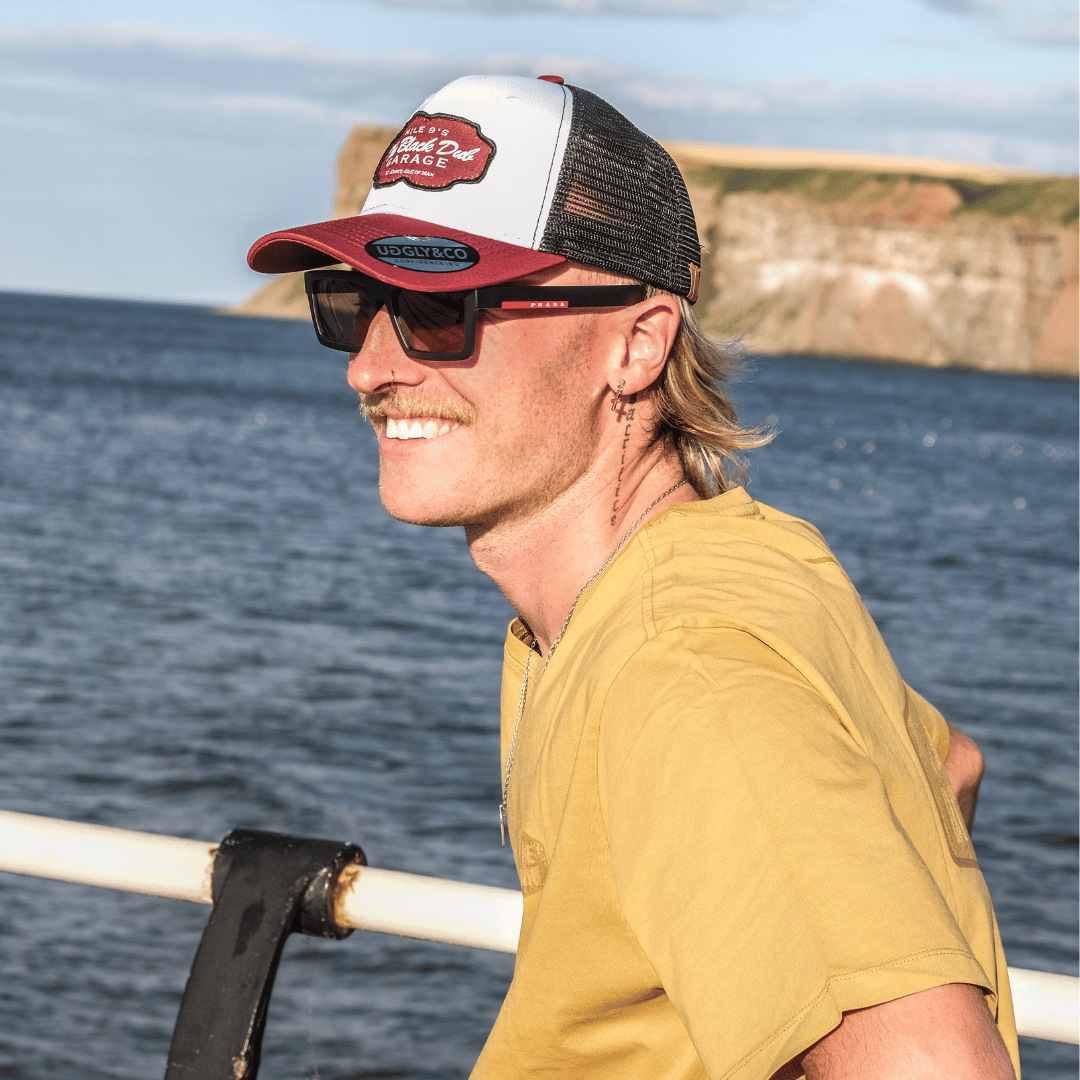 Uggly and Co Black Dub Garage Trucker Hat – Burgundy Isle of Man TT