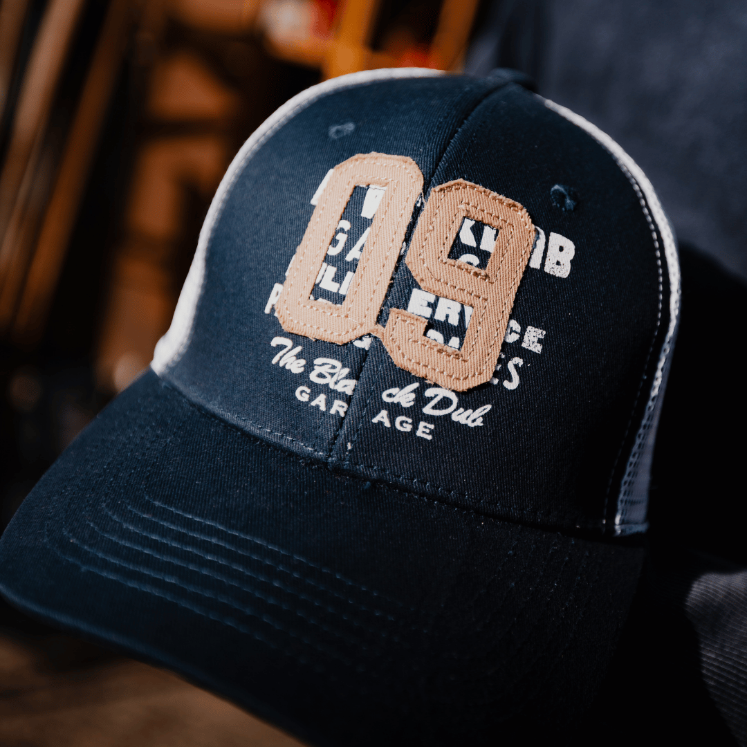 Uggly and Co Navy Parts & Spares '09' Vintage Moto Trucker Hat