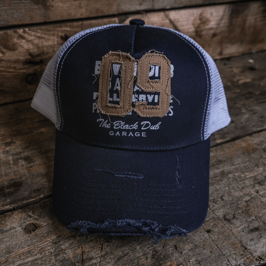 Uggly and Co Navy Parts & Spares '09' Vintage Moto Trucker Hat