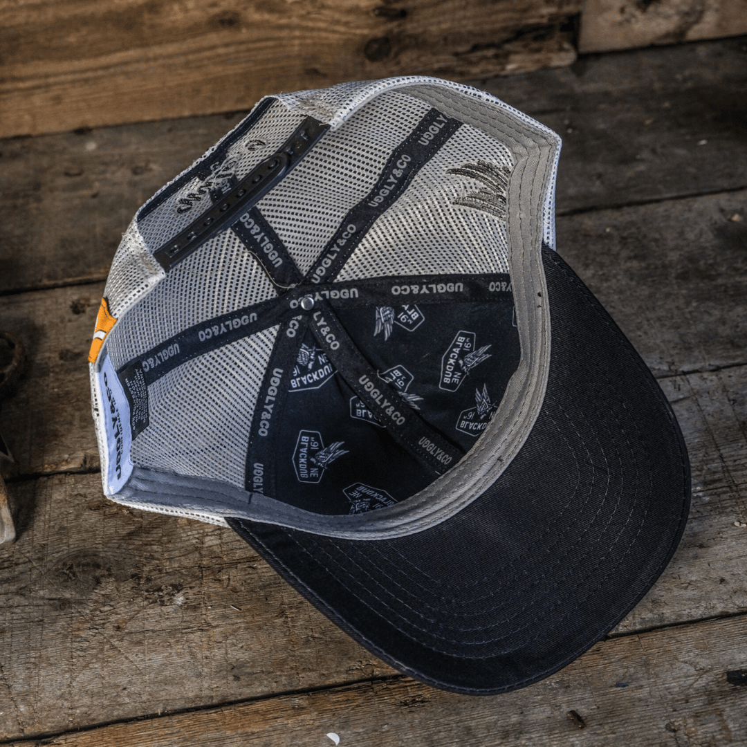 Uggly and Co Mile 9 Wings Trucker Hat – Vintage Navy & Grey Mesh Cap